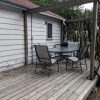 outside deck with patio set and BBQ